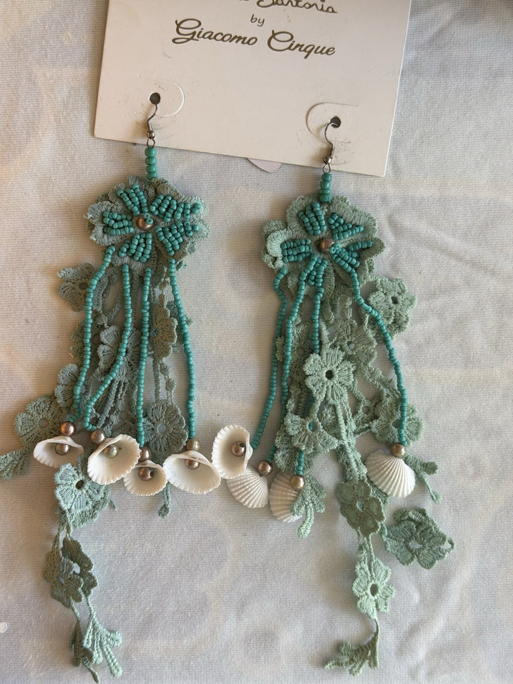 Antica Sartoria crocheted Aqua flower with Sea Shells strands pendant Nwt