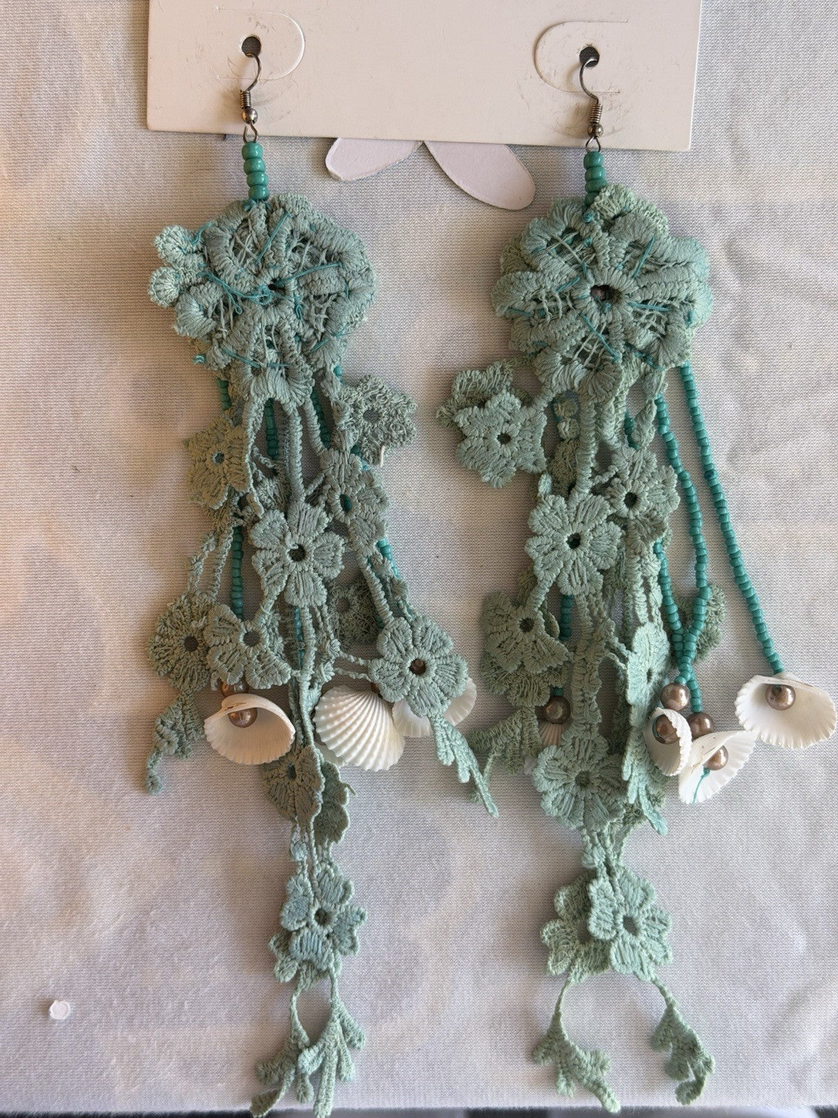 Antica Sartoria crocheted Aqua flower with Sea Shells strands pendant Nwt
